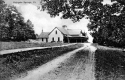 Horse and Carriage in Front of Home