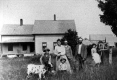 Farm Family in front of their house on Poker Hill Rd