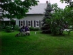 Farm Family in front of their house