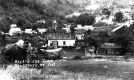 Town and Forested Hill