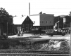 The creamery and a Railroad through Town