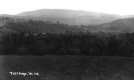 Bird's Eye View of Buildings and Surrounding Hills