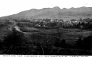 Town, Open Fields, and Mountain