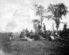 Soldiers Resting in Open Field