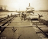 Workers prepare tracks to move steamer Ticonderoga