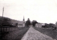 Wooden Fences Line the Street into the Village