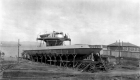 A ferry under construction on the waterfront looking west.
