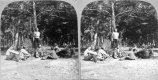 Group of Men Relaxing in a Clearing