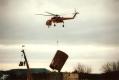 Helicopter delivering silo