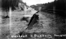 Washout in North Duxbury, railroad tracks and eroded bank