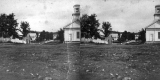 Church and Houses Along Dirt Road