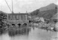 Construction of dam and building