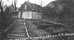 Flood 1927; house washed onto tracks