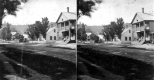 Dirt Road with Trees and Buildings