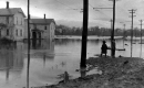 Boys on the Edge of Flood Waters