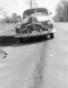 Car on Paved Road