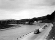 Cars on a Road around a bend