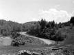 Winding Road and River with Utility lines on right