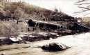 Train Wreck Along a River