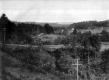 Valley With Fields, Road, and Railraod Tracks
