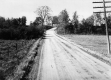 Dirt Road with Surrounding Pastures 