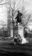 Two women sitting near Lafayette Statue