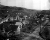 Houses at the Base of a Cleared Slope