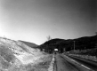 Eroded bank and Road