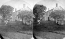 Children Posing in Front of House