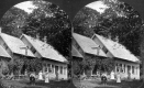 Family Posed in Front of House