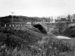Bridge with Guard Rails and Houses