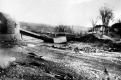 Damaged Bridge with River