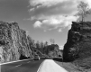 Car on Interstate 89 Between Outcrops
