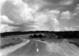 Farm Between Dirt and Paved Roads