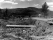 Construction Beside a Dirt Road Looking West