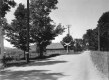 Dirt Road with Barn