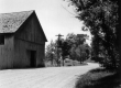 Barn on Bank of Dirt Road