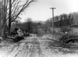 Improved road lined with stone wall