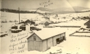 Ice house and lumber pile at the Kittell Farm