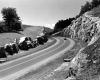 Car Traveling on US Route 2 Between Outcrops