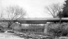 Debris Filled River with US Route 7 Bridge