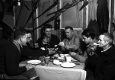 Hunters eating dinner