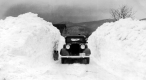 Snowbanks taller than car
