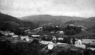 Woman in Front of Town
