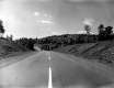 Bus Traveling on a Paved Road