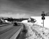 Cars on Paved Road Heading Towards Interstate 89