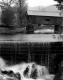 Wooden Covered Bridge Over River