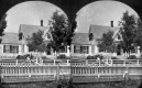 Woman with Horse in Front of House