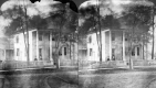 Women in Front of a House