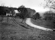 House and Barn Along Rural Road